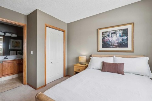 63 Evergreen Heights Sw, Calgary, AB - Indoor Photo Showing Bedroom