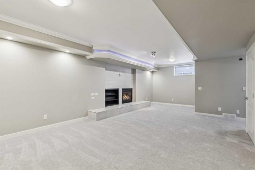 63 Evergreen Heights Sw, Calgary, AB - Indoor Photo Showing Basement