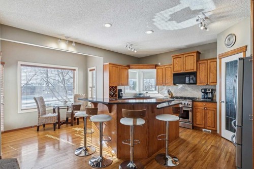 63 Evergreen Heights Sw, Calgary, AB - Indoor Photo Showing Kitchen With Stainless Steel Kitchen