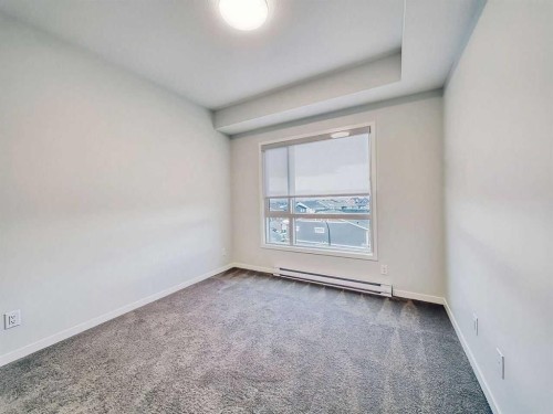 2412-220 Seton Grove Se, Calgary, AB - Indoor Photo Showing Other Room