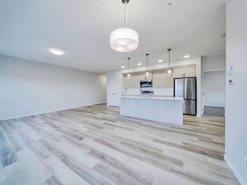 2412-220 Seton Grove Se, Calgary, AB - Indoor Photo Showing Kitchen