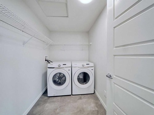 2412-220 Seton Grove Se, Calgary, AB - Indoor Photo Showing Laundry Room