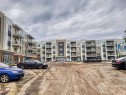2412-220 Seton Grove Se, Calgary, AB  - Outdoor With Balcony With Facade 