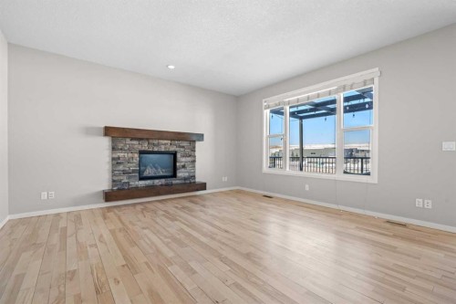 2148 Brightoncrest Green Se, Calgary, AB - Indoor Photo Showing Living Room With Fireplace
