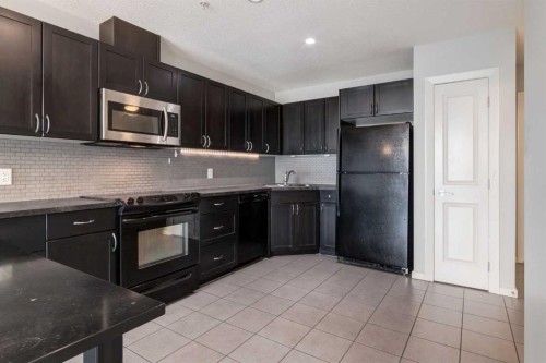 2704-211 13 Avenue Se, Calgary, AB - Indoor Photo Showing Kitchen