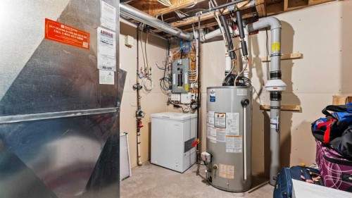 153 Heritage Bay, Cochrane, AB - Indoor Photo Showing Basement