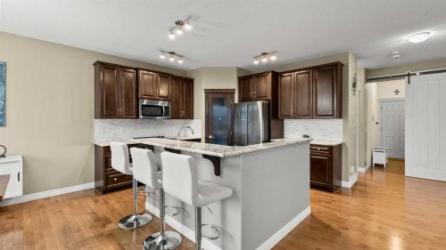 153 Heritage Bay, Cochrane, AB - Indoor Photo Showing Kitchen