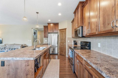 883 Auburn Bay Boulevard Se, Calgary, AB - Indoor Photo Showing Kitchen With Stainless Steel Kitchen With Double Sink With Upgraded Kitchen