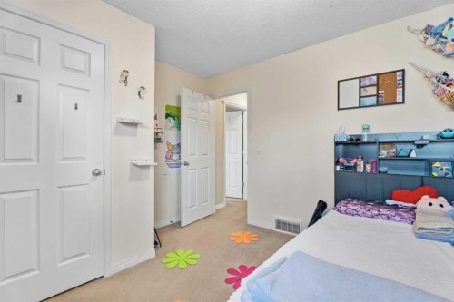 883 Auburn Bay Boulevard Se, Calgary, AB - Indoor Photo Showing Bedroom