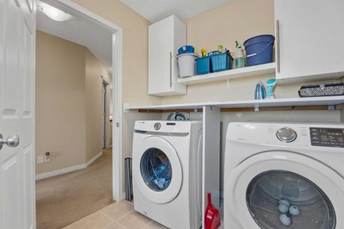 883 Auburn Bay Boulevard Se, Calgary, AB - Indoor Photo Showing Laundry Room