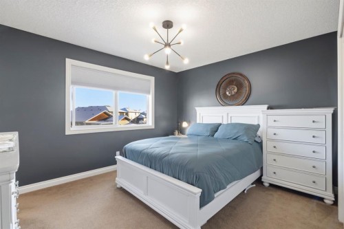 729 Hampton Hills Drive Ne, High River, AB - Indoor Photo Showing Bedroom