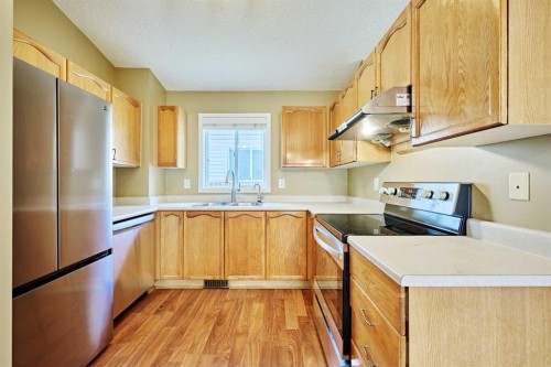 152 Harvest Gold Heights Ne, Calgary, AB - Indoor Photo Showing Kitchen With Double Sink