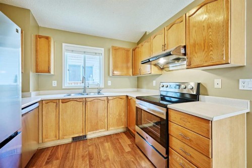 152 Harvest Gold Heights Ne, Calgary, AB - Indoor Photo Showing Kitchen With Double Sink