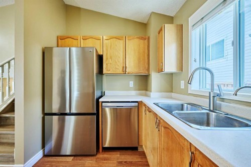 152 Harvest Gold Heights Ne, Calgary, AB - Indoor Photo Showing Kitchen With Double Sink