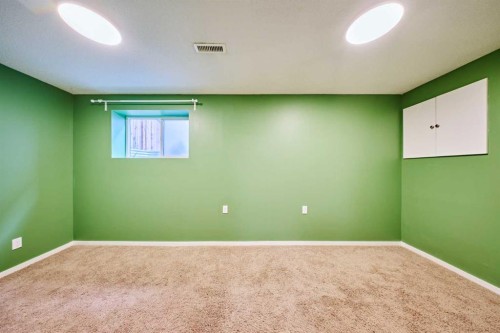 152 Harvest Gold Heights Ne, Calgary, AB - Indoor Photo Showing Other Room