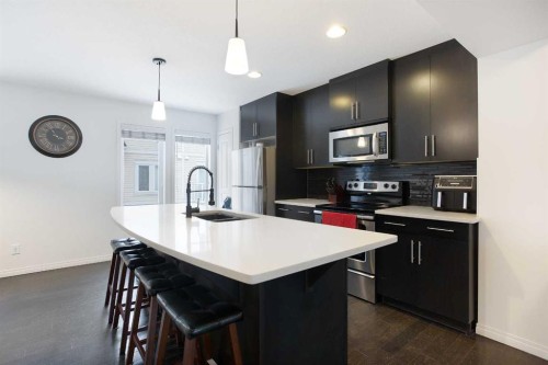 210 Auburn Bay Square Se, Calgary, AB - Indoor Photo Showing Kitchen With Stainless Steel Kitchen With Double Sink With Upgraded Kitchen