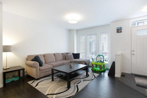 210 Auburn Bay Square Se, Calgary, AB - Indoor Photo Showing Living Room
