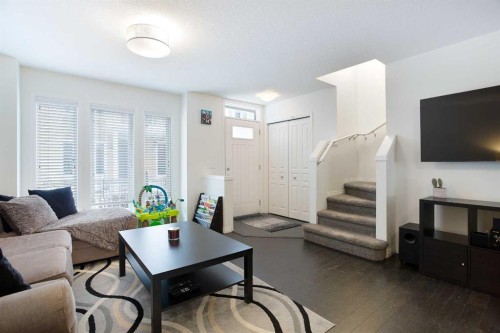 210 Auburn Bay Square Se, Calgary, AB - Indoor Photo Showing Living Room