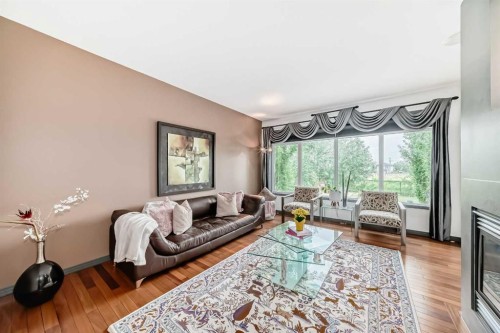 206 Tuscany Ravine Close Nw, Calgary, AB - Indoor Photo Showing Living Room