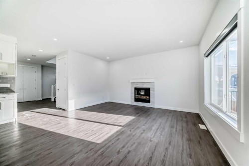 772 Edgefield Crescent, Strathmore, AB - Indoor Photo Showing Living Room With Fireplace