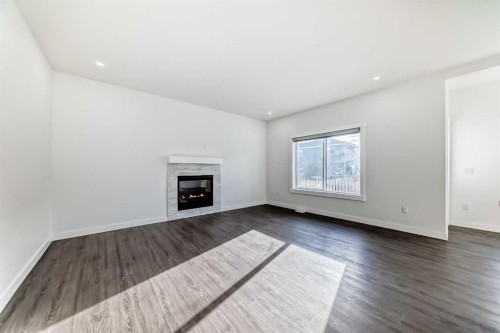 772 Edgefield Crescent, Strathmore, AB - Indoor Photo Showing Living Room With Fireplace