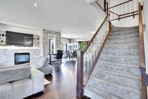 172 Kinniburgh Way, Chestermere, AB - Indoor With Fireplace