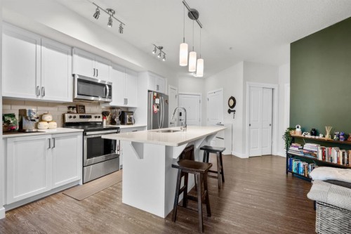 2310-3727 Sage Hill Drive Nw, Calgary, AB - Indoor Photo Showing Kitchen With Stainless Steel Kitchen With Upgraded Kitchen