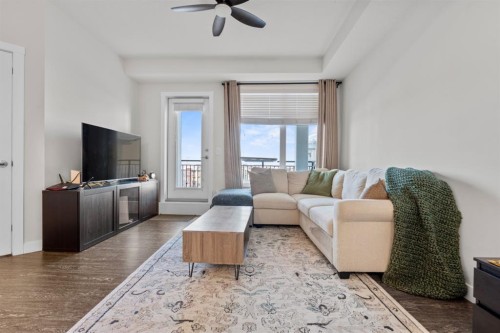 2310-3727 Sage Hill Drive Nw, Calgary, AB - Indoor Photo Showing Living Room