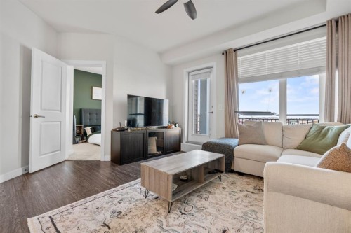 2310-3727 Sage Hill Drive Nw, Calgary, AB - Indoor Photo Showing Living Room