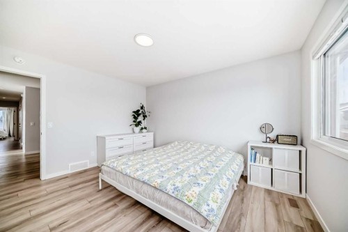 24 Royston Rise Nw, Calgary, AB - Indoor Photo Showing Bedroom