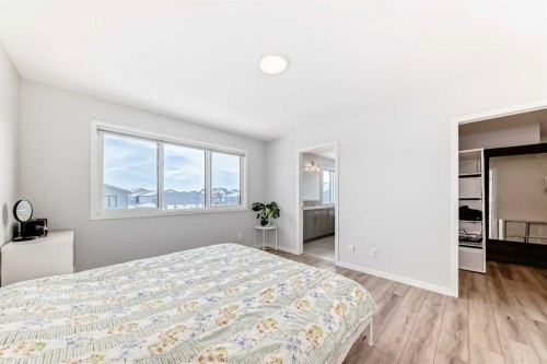 24 Royston Rise Nw, Calgary, AB - Indoor Photo Showing Bedroom