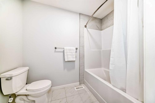 24 Royston Rise Nw, Calgary, AB - Indoor Photo Showing Bathroom