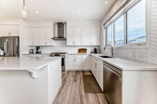24 Royston Rise Nw, Calgary, AB - Indoor Photo Showing Kitchen With Upgraded Kitchen