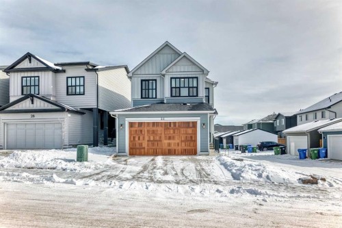 24 Royston Rise Nw, Calgary, AB - Outdoor With Facade