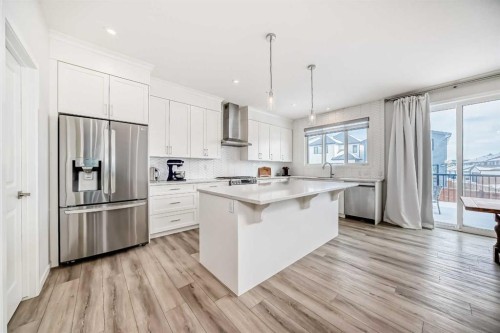 24 Royston Rise Nw, Calgary, AB - Indoor Photo Showing Kitchen With Upgraded Kitchen