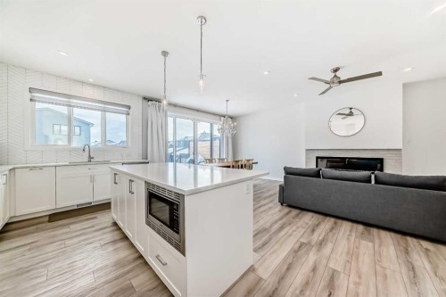 24 Royston Rise Nw, Calgary, AB - Indoor Photo Showing Kitchen With Upgraded Kitchen