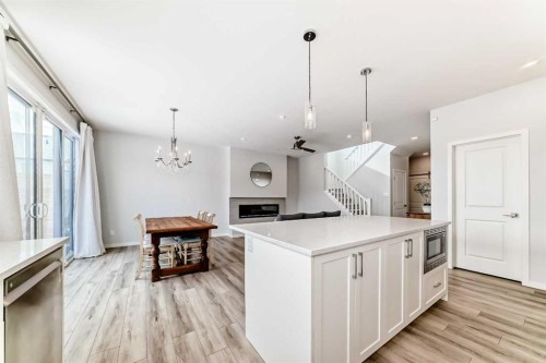 24 Royston Rise Nw, Calgary, AB - Indoor Photo Showing Kitchen With Upgraded Kitchen