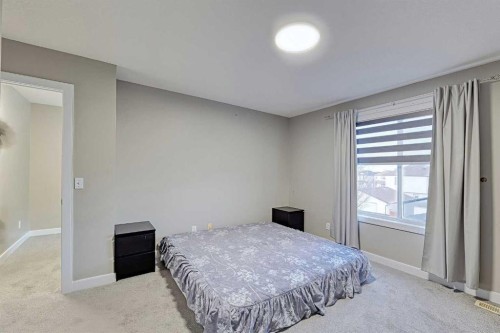 303 Saddlebrook Way Ne, Calgary, AB - Indoor Photo Showing Bedroom