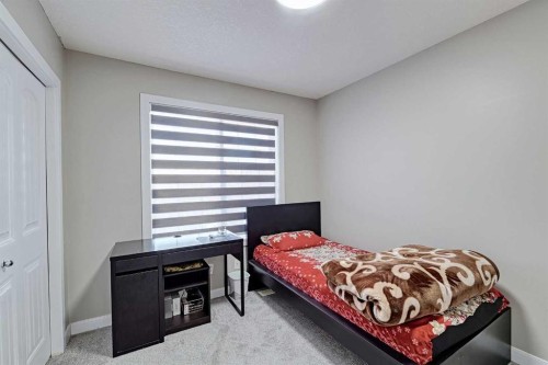 303 Saddlebrook Way Ne, Calgary, AB - Indoor Photo Showing Bedroom