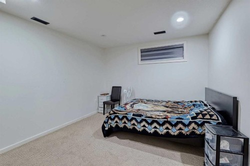 303 Saddlebrook Way Ne, Calgary, AB - Indoor Photo Showing Bedroom