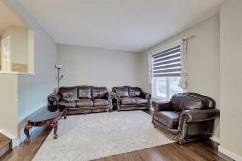 303 Saddlebrook Way Ne, Calgary, AB - Indoor Photo Showing Living Room