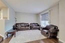 303 Saddlebrook Way Ne, Calgary, AB  - Indoor Photo Showing Living Room 