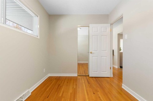 123 Glacier Drive Sw, Calgary, AB - Indoor Photo Showing Other Room