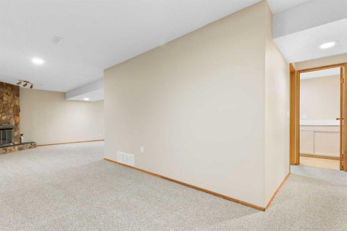 123 Glacier Drive Sw, Calgary, AB - Indoor Photo Showing Other Room