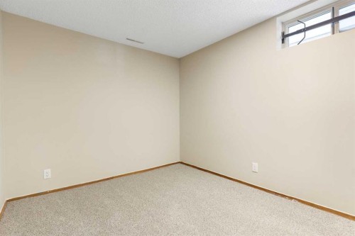 123 Glacier Drive Sw, Calgary, AB - Indoor Photo Showing Other Room