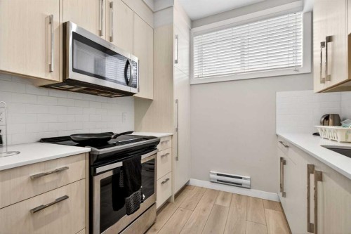 1220 Cornerstone Way Ne, Calgary, AB - Indoor Photo Showing Kitchen With Upgraded Kitchen