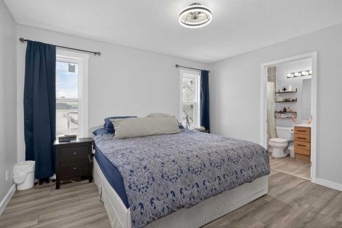 38 Canoe Circle Sw, Airdrie, AB - Indoor Photo Showing Bedroom