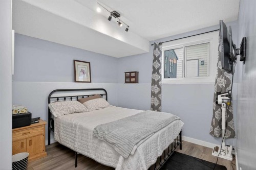 38 Canoe Circle Sw, Airdrie, AB - Indoor Photo Showing Bedroom