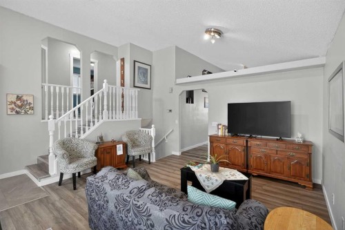 38 Canoe Circle Sw, Airdrie, AB - Indoor Photo Showing Living Room
