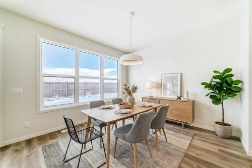 54 Bartlett Row Se, Calgary, AB - Indoor Photo Showing Dining Room